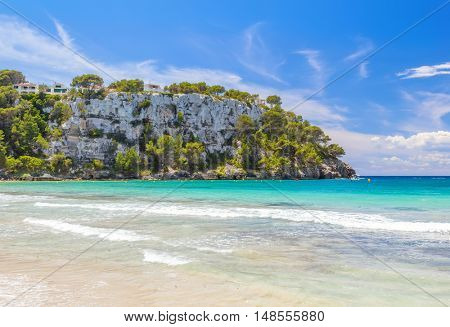 View on Mirador Sa Punta cliff from Cala Galdana beach, Menorca island, Balearic islands, Spain.