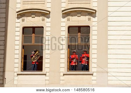 PRAGUE CZECH REPUBLIC - JULY 4 2014: Castle guards (Hradni straz) of presidential palace during ceremonial changing of guards. It takes place daily at noon accompanied by a brass band.