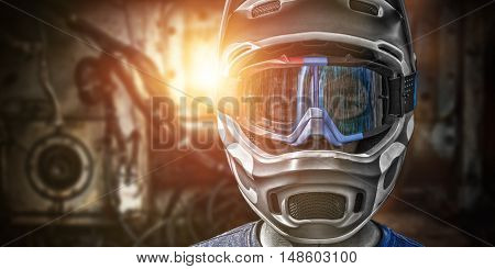 Portrait of a young man in a professional full protective helmet