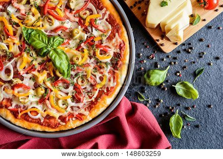 Pizza With Salami, Olives, Pepper, Onion And Cheese