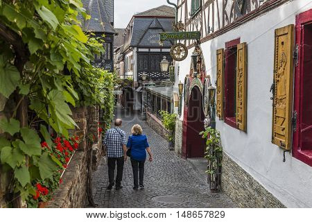 Rudesheim Germany - August 20 2016: Drosselgasse with tourists in Rudesheim near the river Rhine.