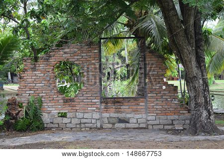 Brick Window With Green Vines In Countryside