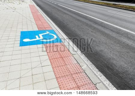 Disabled Parking Sign On Street. Road Sign