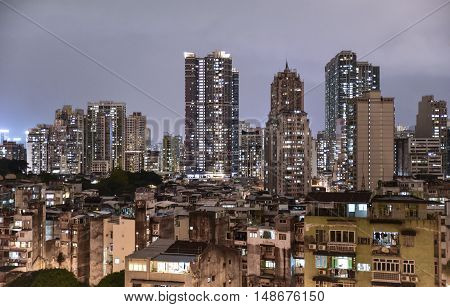 A dense residential area with contrasting periods of development and status; old and the new, rich and the poor.