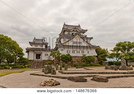 KISHIWADA JAPAN - JULY 24 2016: Main keep of Kishiwada castle Japan. Erected in 1585 burned down in 1827 reconstructed in 1954