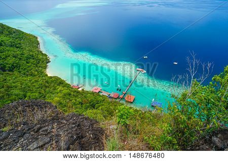 View on top of Bohey Dulang island near Sipadan Island,Sabah,Borneo.Tropical paradise island with bright smooth mirror sand & crystal clear water with rocky shore in the island of Semporna,Borneo