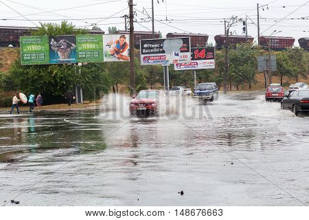 Odessa, Ukraine - September 20, 2016: Driving Cars On A Flooded Road During Flooding Caused By Torre