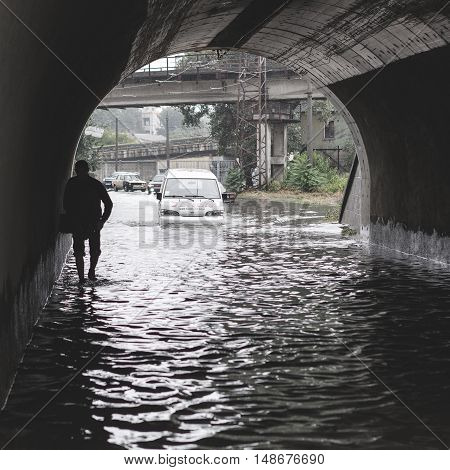 Odessa, Ukraine - September 20, 2016: Driving Cars On A Flooded Road During Flooding Caused By Torre