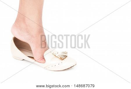 Woman feet wearing shoes on white background fashion concept