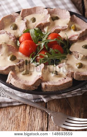 Italian Vitello Tonnato With Tuna Sauce And Capers Close-up. Vertical