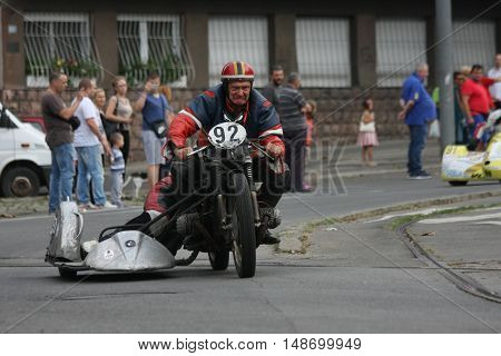 BELGRADE,SERBIA - SEPTEMBER 10, 2016: Oldtimer sidecar motorcycle at the commercial race of old cars in memory of formula 1 race held on the same place in 1939 two days after the beginning of Second World War when the famous Italian driver Tazio Nuvolari 