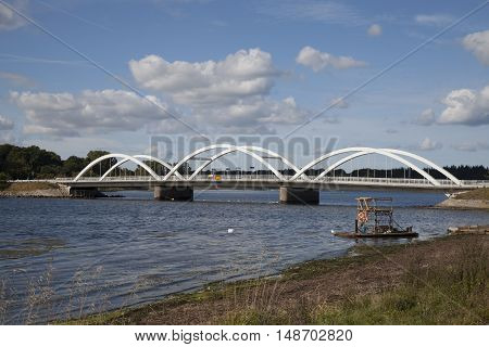 view on a little bridge run over a danish fjord.