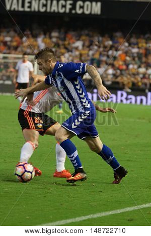 VALENCIA, SPAIN - SEPTEMBER 22nd: Katai (R) with ball during Spanish soccer league match between Valencia CF and Deportivo Alaves at Mestalla Stadium on September 22, 2016 in Valencia, Spain