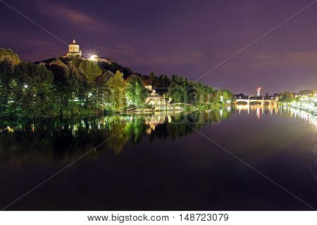 Monte dei Cappuccini reflecting in the river Po, Turin, Italy