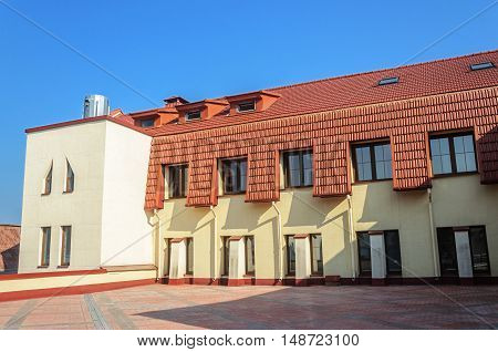 New building with red tiled roof in Trinity Suburb Minsk Belarus