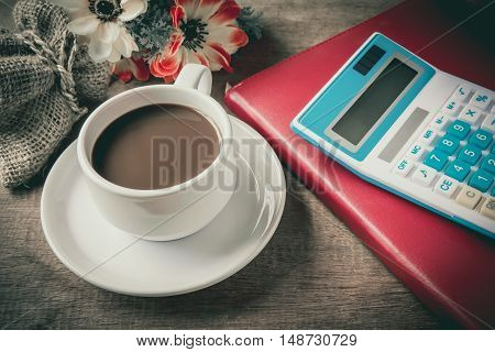 Cup Of Coffee, Books And Calculator, On Table Wood