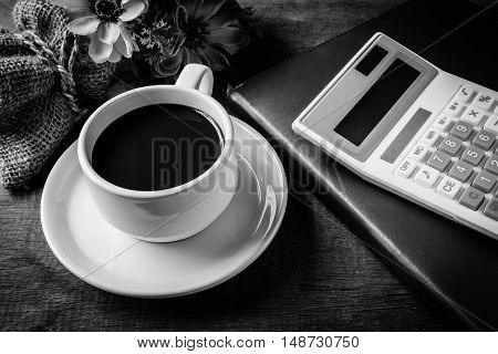 Cup Of Coffee, Books And Calculator, On Table Wood