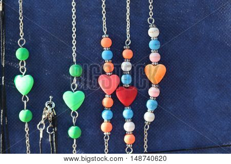 picture of a cheap jewelry at a flea market.