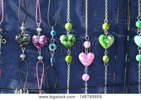 picture of a cheap jewelry at a flea market.