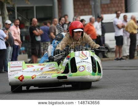 BELGRADE,SERBIA - SEPTEMBER 10, 2016: Oldtimer sidecar motorcycle at the commercial race of old cars in memory of formula 1 race held on the same place in 1939 two days after the beginning of Second World War when the famous Italian driver Tazio Nuvolari 