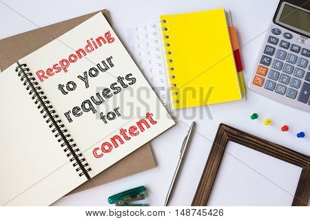 Text Responding to your requests for content on white paper book on table / business concept