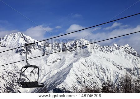 Chair-lift In Snow Winter Mountains At Nice Sunny Day