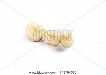 Dental ceramic tooth crowns on white background. Isolated.