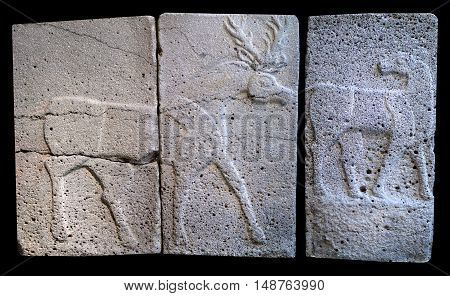 Ancient stone bas-relief with deer (late Hittite period)