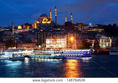 View from Galata Bridge to Suleymanie Mosque in Istanbul, Turkey.
