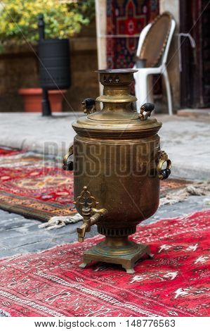 Ancient samovar. The old copper samovar with medals