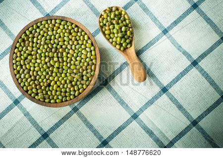 mung bean green in spoon on the tablecloth in bowl