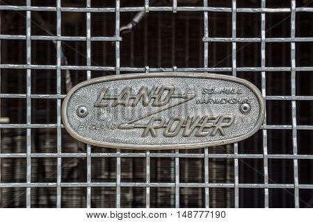 KIEV UKRAINE - April 26 2015: The Retro OldCarFest in Kiev. Retro logo Land Rover closeup on a radiator.