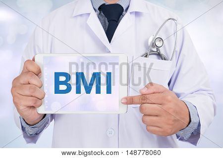 Doctor holding a tablet pc BMI doctor work to touch hand