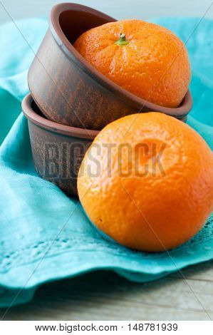 Fresh and ripe orange mandarins tangerine closeup. Rustic style