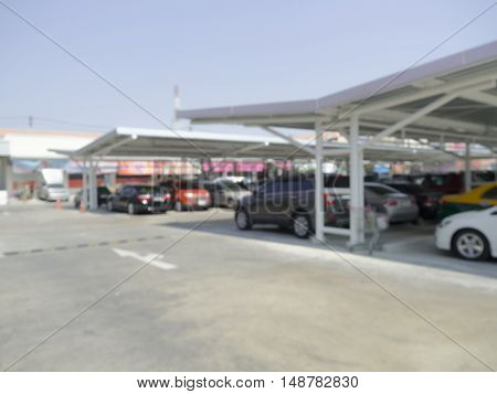 Blurred car park at supermarket for background usage