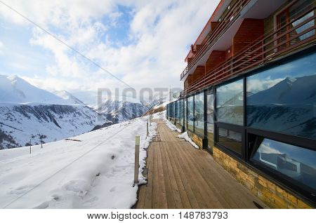 Ski resort in mountains. Extreme sport tourism concept for snowboard ride in alpes swiss norwegian. Oppening snow