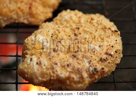 sticky rice with egg grilled Asian traditional food (Kgawhie) at street food in Thailand.
