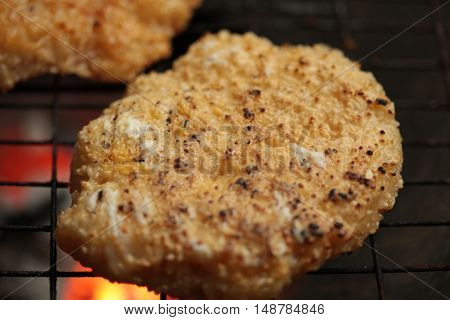 sticky rice with egg grilled Asian traditional food (Kgawhie) at street food in Thailand