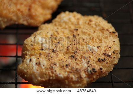 sticky rice with egg grilled Asian traditional food (Kgawhie) at street food in Thailand