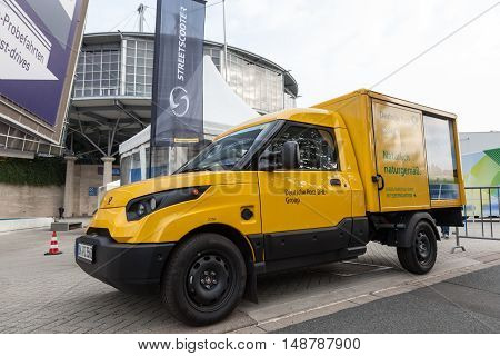 HANNOVER GERMANY - 23 2016: New electric mail delivery van from the Deutsche Post DHL at the IAA Commercial Vehicles 2016 International Trade Fair