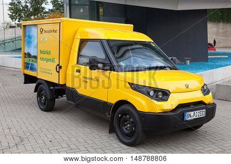 HANNOVER GERMANY - 23 2016: New electric mail delivery van from the Deutsche Post DHL at the IAA Commercial Vehicles 2016 International Trade Fair
