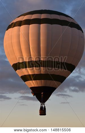 QUEENSBURY, NY - SEP 24: Balloon launch at dawn at the 2016 Adirondack Hot Air Balloon Festival held from Sep 22-25. Thousands of people attended the festival which is the largest of its kind on the East coast.