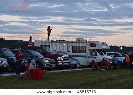 QUEENSBURY, NY - SEP 24: Balloon launch at dawn at the 2016 Adirondack Hot Air Balloon Festival held from Sep 22-25. Thousands of people attended the festival which is the largest of its kind on the East coast.