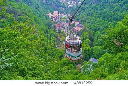BORJOMI GEORGIA - MAY 27 2016: The cableway is the best choice to overlook the sites of Nature Reserve of Borjomi-Kharagauli on May 27 in Borjomi.