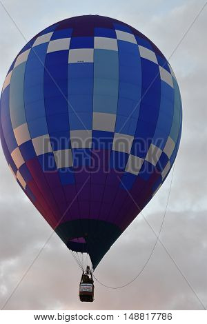QUEENSBURY, NY - SEP 24: Balloon launch at dawn at the 2016 Adirondack Hot Air Balloon Festival held from Sep 22-25. Thousands of people attended the festival which is the largest of its kind on the East coast.