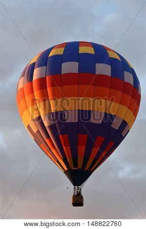 QUEENSBURY, NY - SEP 24: Balloon launch at dawn at the 2016 Adirondack Hot Air Balloon Festival held from Sep 22-25. Thousands of people attended the festival which is the largest of its kind on the East coast.
