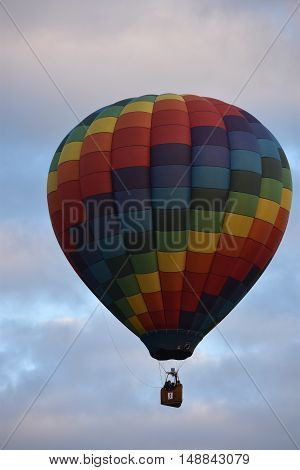 QUEENSBURY, NY - SEP 24: Balloon launch at dawn at the 2016 Adirondack Hot Air Balloon Festival held from Sep 22-25. Thousands of people attended the festival which is the largest of its kind on the East coast.