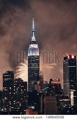 NEW YORK CITY - JUL 4: Empire State Building with fireworks on July 4, 2015 in Manhattan, New York City. With population of 8.4M, it is the most populous city in the United States.