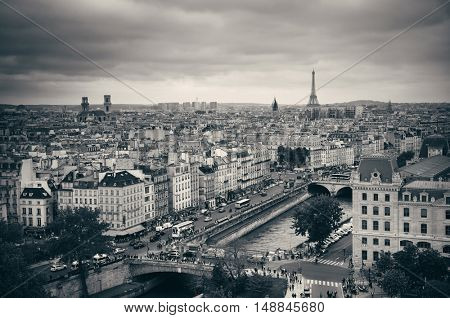 PARIS, FRANCE - MAY 13: Rooftop view with street and Eiffel tower on May 13, 2015 in Paris. With the population of 2M, Paris is the capital and most-populous city of France.