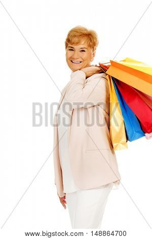 Happy business woman holging shopping bags